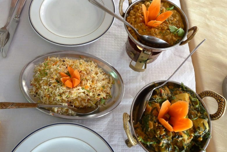 Clase de cocina y cena con una familia india