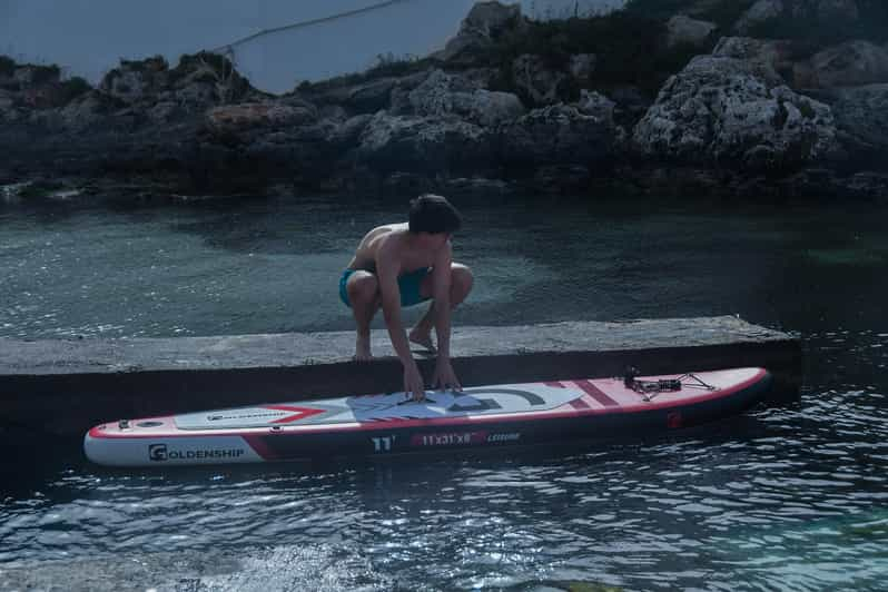 puesta de sol de paddle surf con espectáculo de luces LED