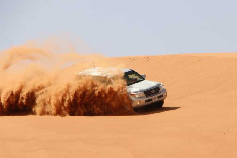 Desde Dubai: Paseo por el Desierto, Paseo en Camello, Sandboard y Cena con Barbacoa