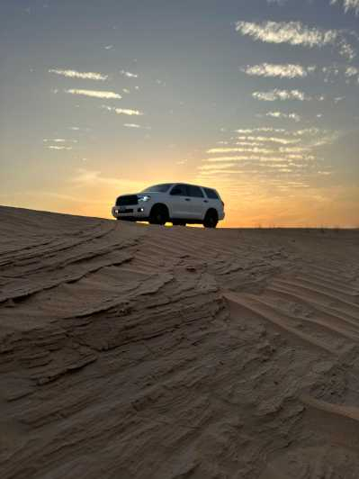 Dubai: Safari por las Dunas Rojas DuneBashing Paseo en camello Sandboarding