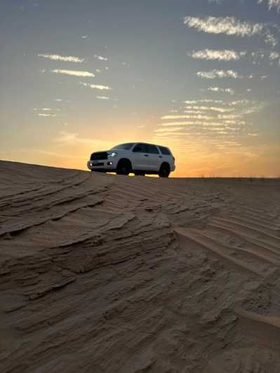 Imagen del tour: Dubai: Safari por las Dunas Rojas DuneBashing Paseo en camello Sandboarding