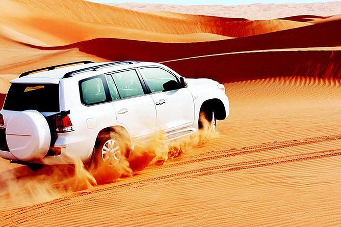 Imagen del tour: Safari por las dunas rojas con sandboard y paseo en camello desde Ras Al Khayma
