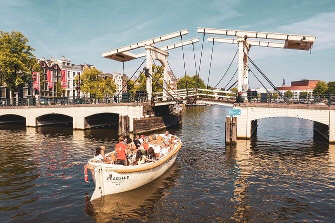Imagen del tour: Crucero por los canales de Ámsterdam en barco abierto - Guía local en vivo con bar a bordo