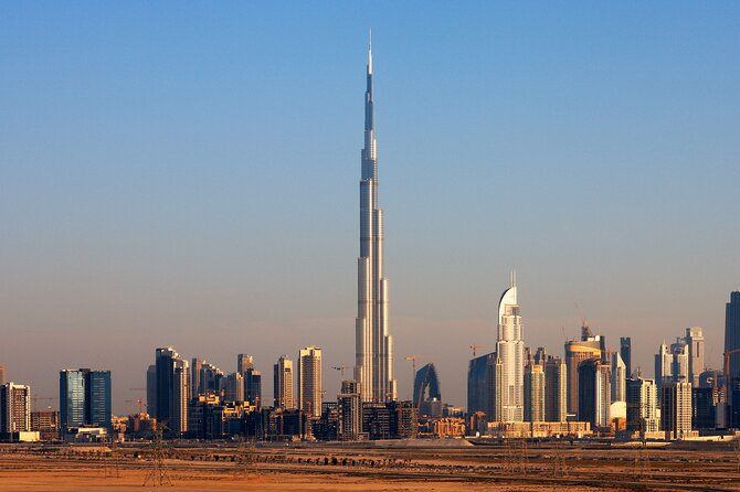 Imagen del tour: Vista privada del atardecer del Burj Khalifa en la cima con espectáculo de fuentes